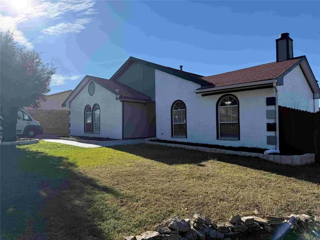a house view with a outdoor space