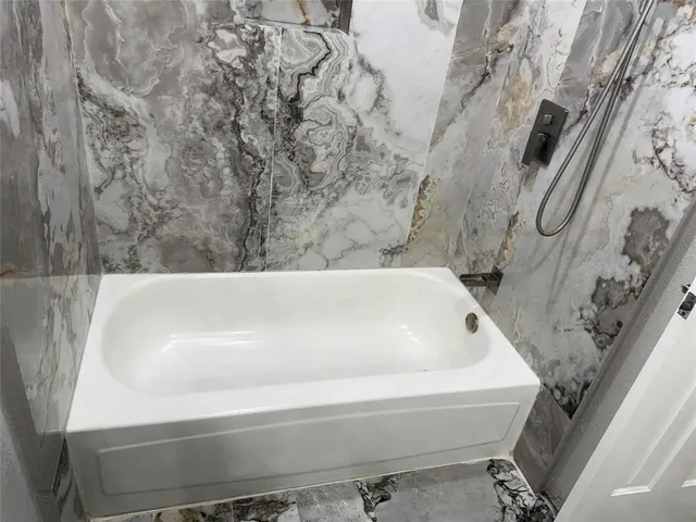 a bathroom with a bathtub