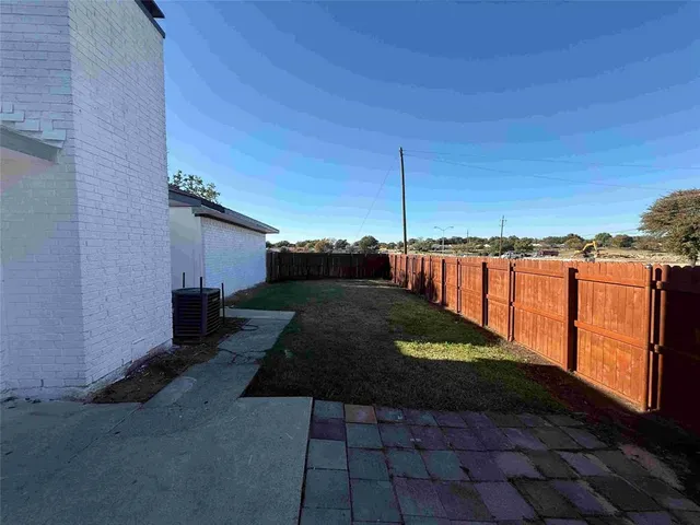 a view of a street with an ocean view