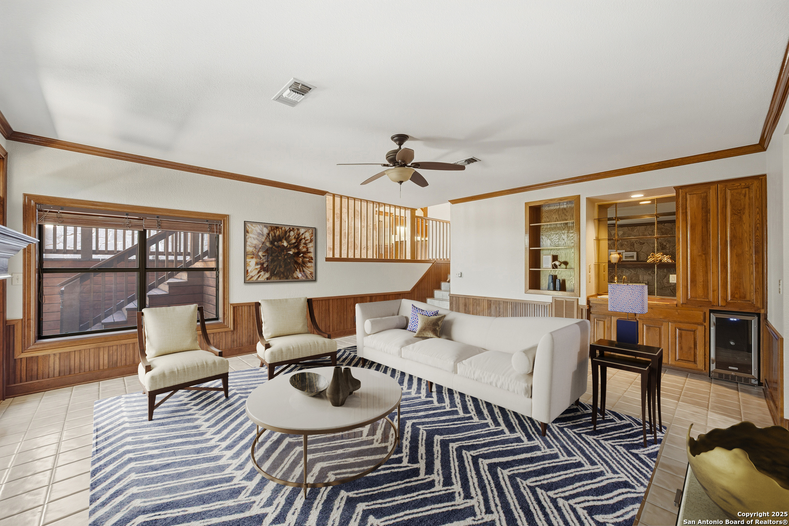 14819 Seven L Trail Helotes, TX 78023 - Photo 16 of 61 a living room with furniture and a large window