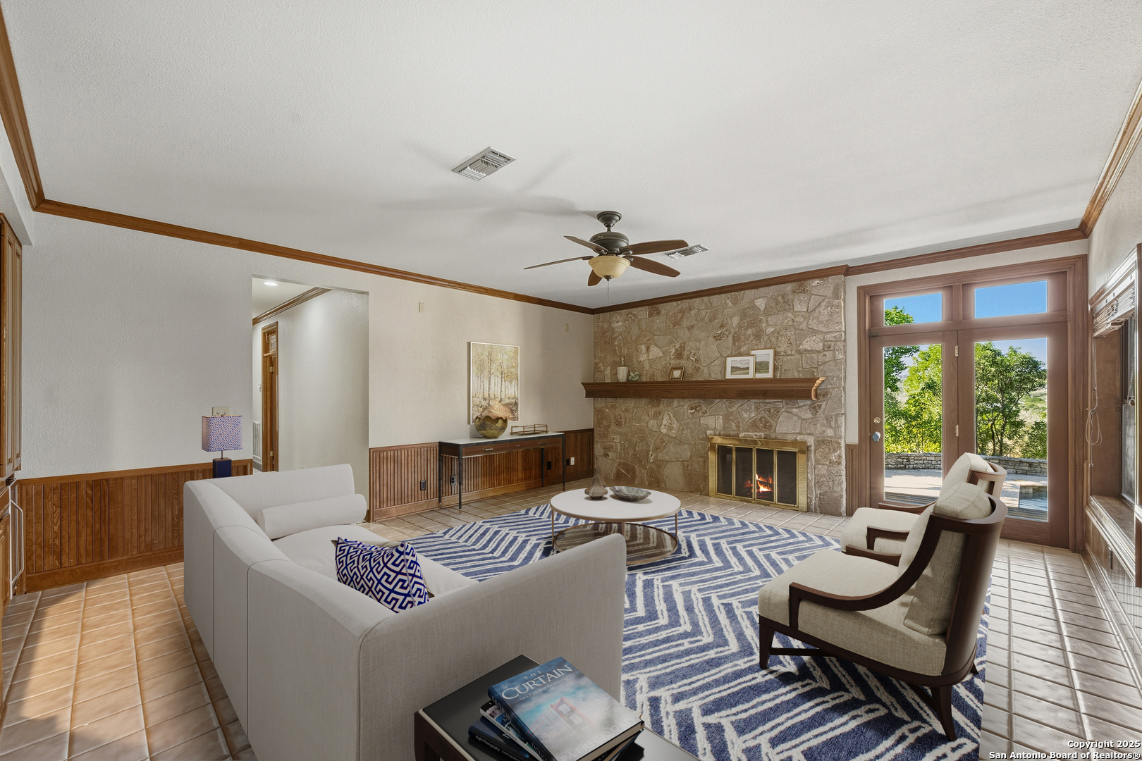 14819 Seven L Trail Helotes, TX 78023 - Photo 17 of 61 a living room with furniture and a fireplace