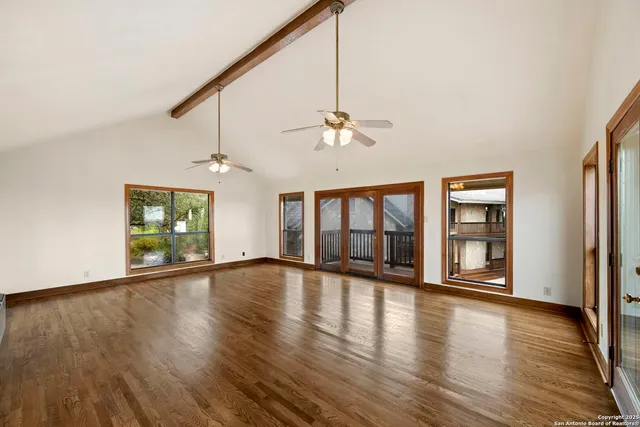 a view of a stone house with a fountain