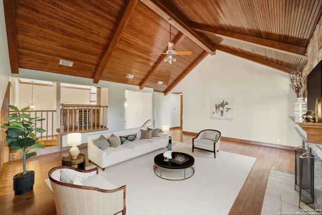a view of a balcony with wooden floor