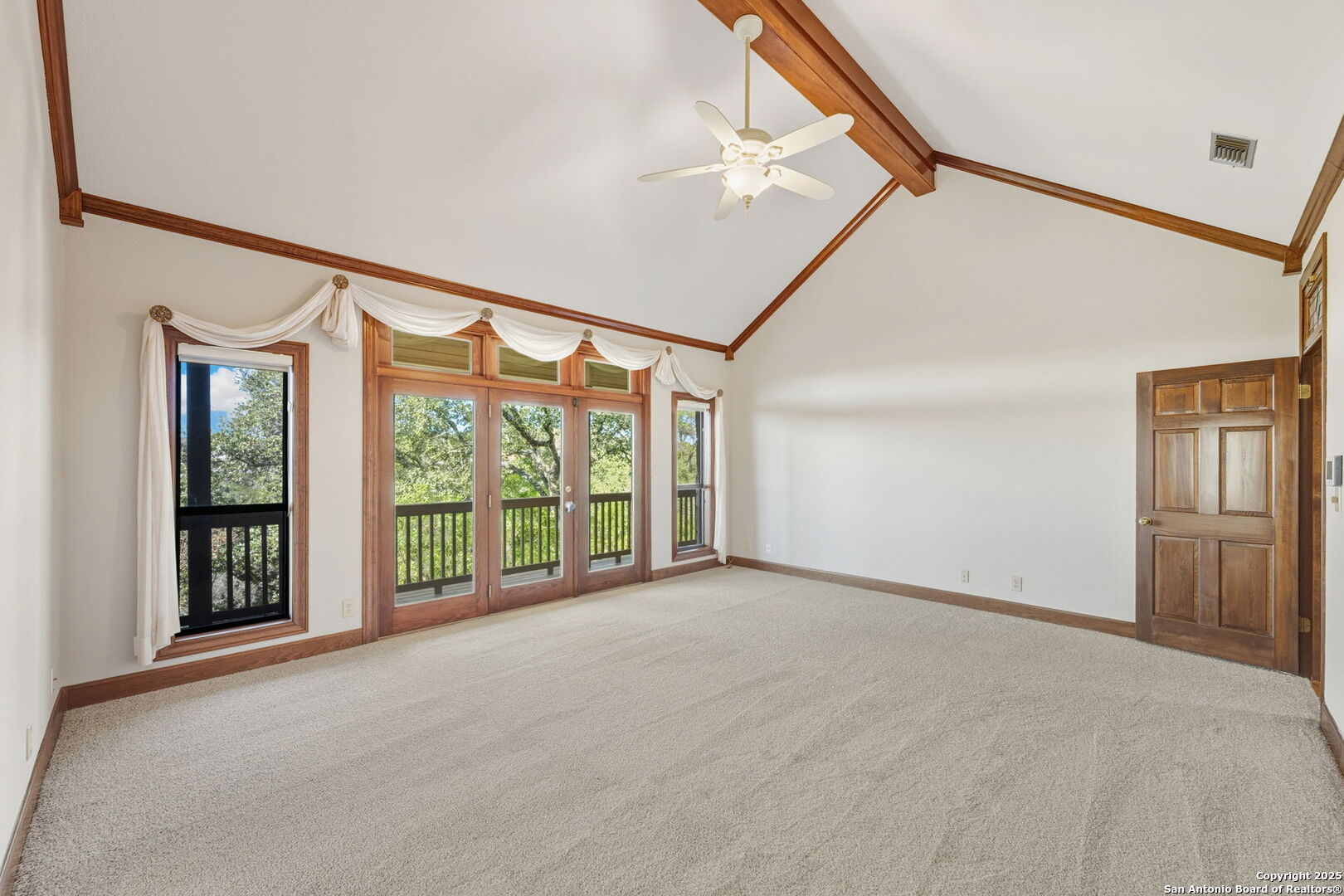 14819 Seven L Trail Helotes, TX 78023 - Photo 45 of 61 an empty room with windows