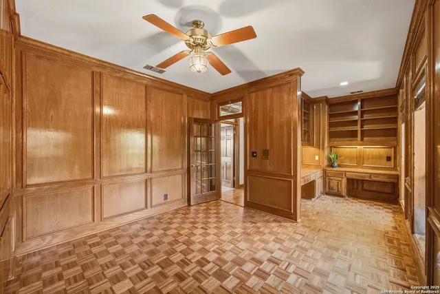 a backyard of a house with a yard and outdoor seating