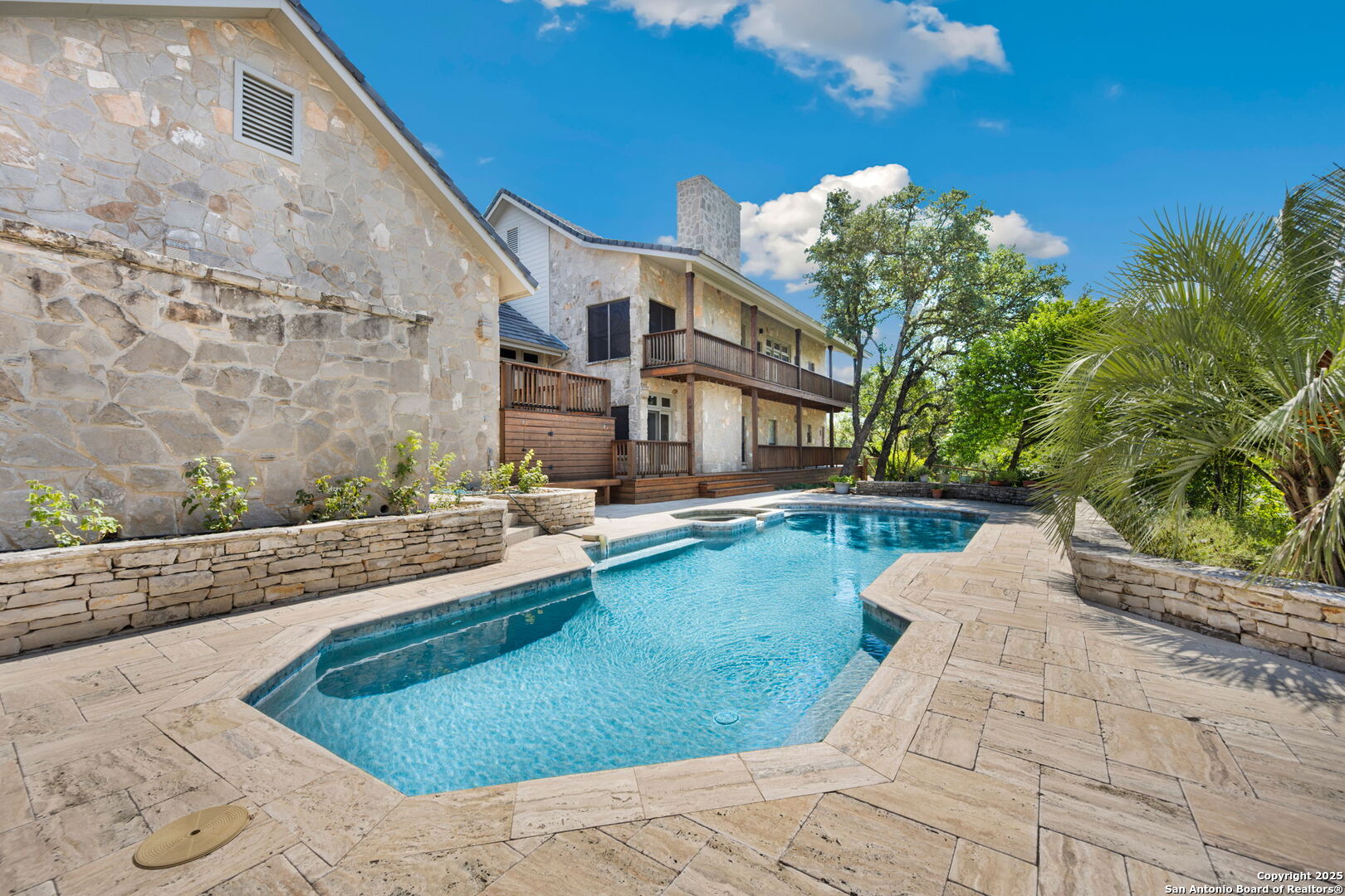 14819 Seven L Trail Helotes, TX 78023 - Photo 48 of 61 a view of a house with swimming pool