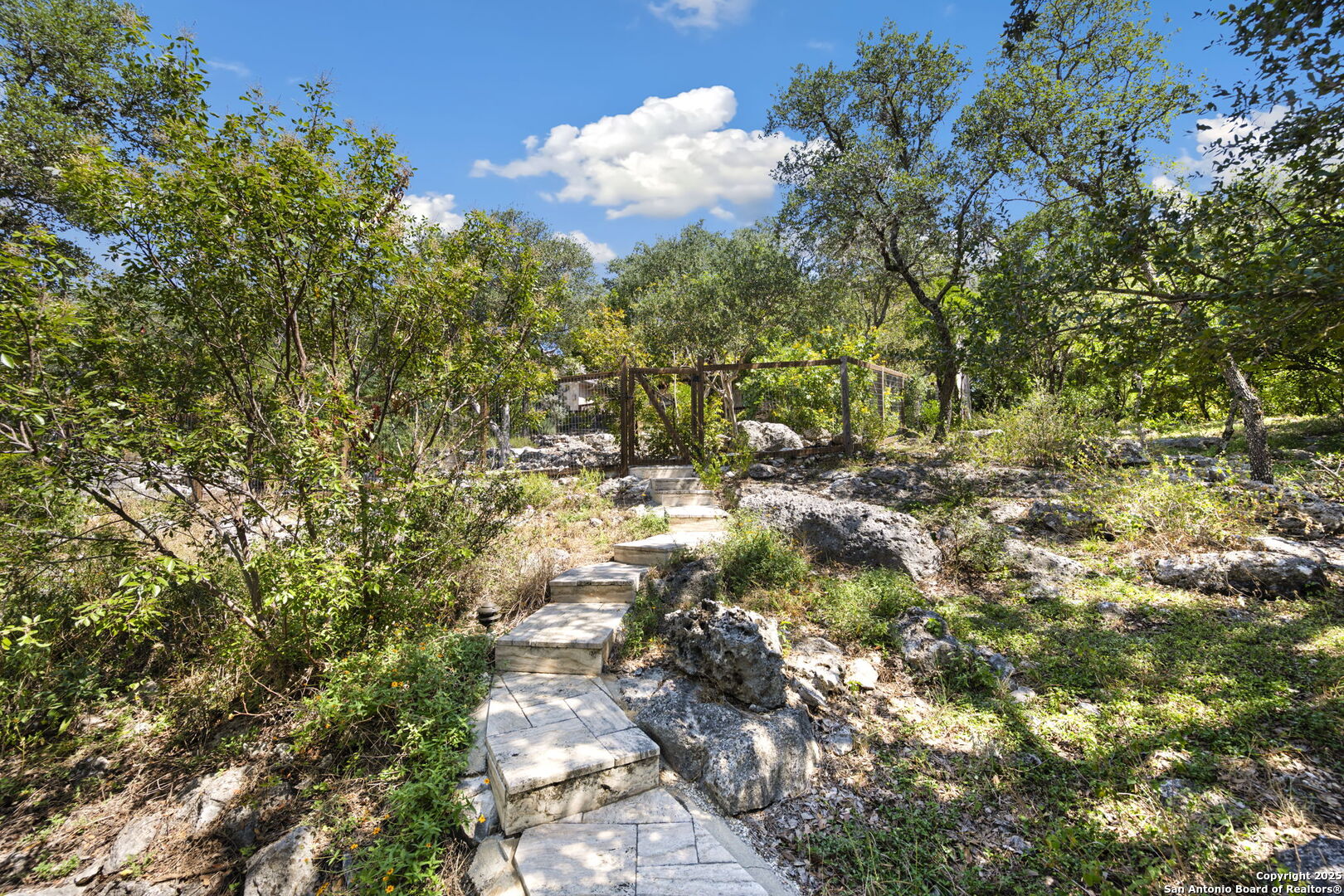 14819 Seven L Trail Helotes, TX 78023 - Photo 59 of 61 a picture of street with lots of trees