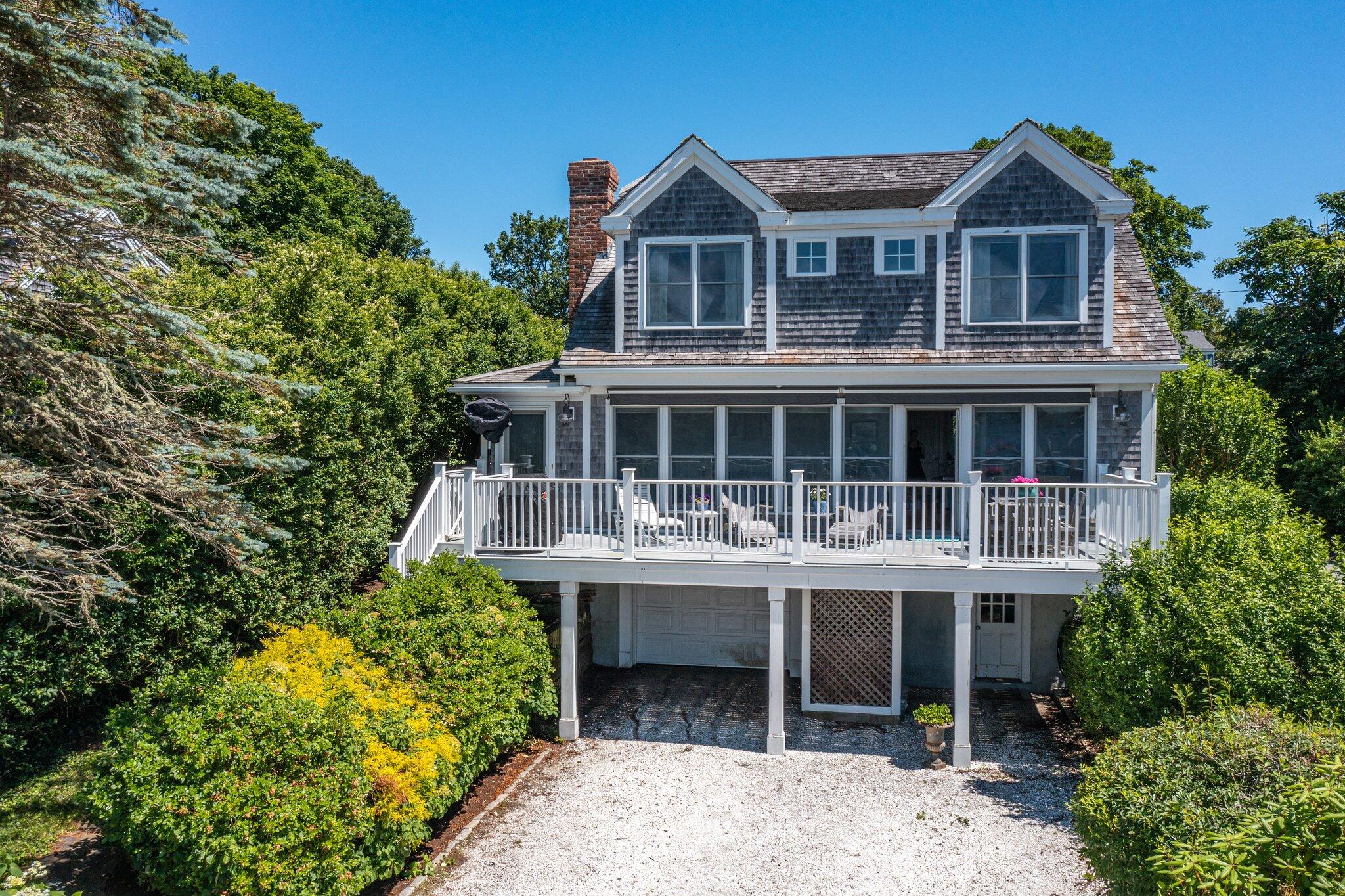 a house view with a garden space