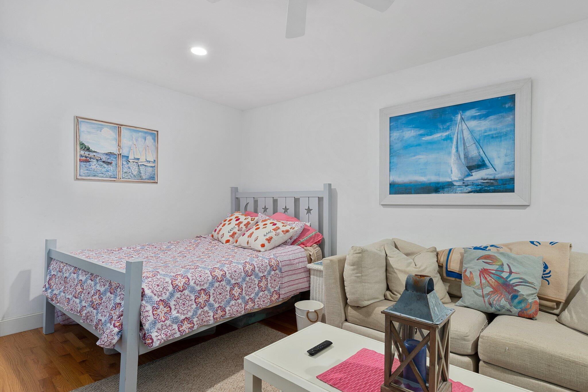 81 Mill Pond Road Chatham, MA 02633 - Photo 21 of 59 a bedroom with a bed and furniture