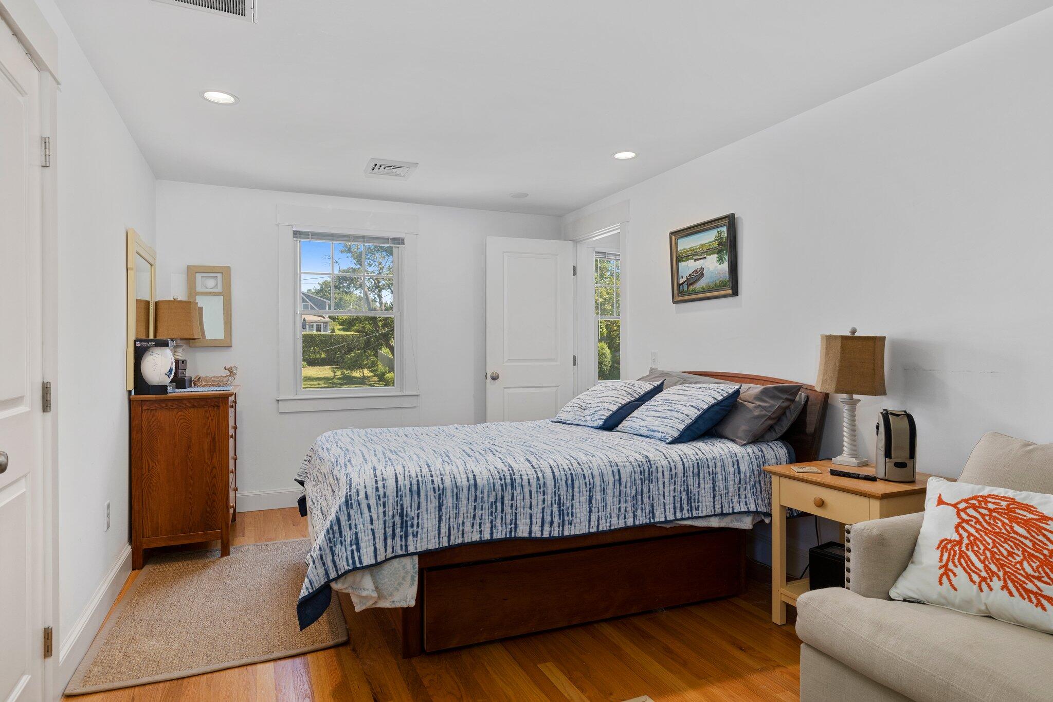81 Mill Pond Road Chatham, MA 02633 - Photo 25 of 59 a bedroom with a bed and window