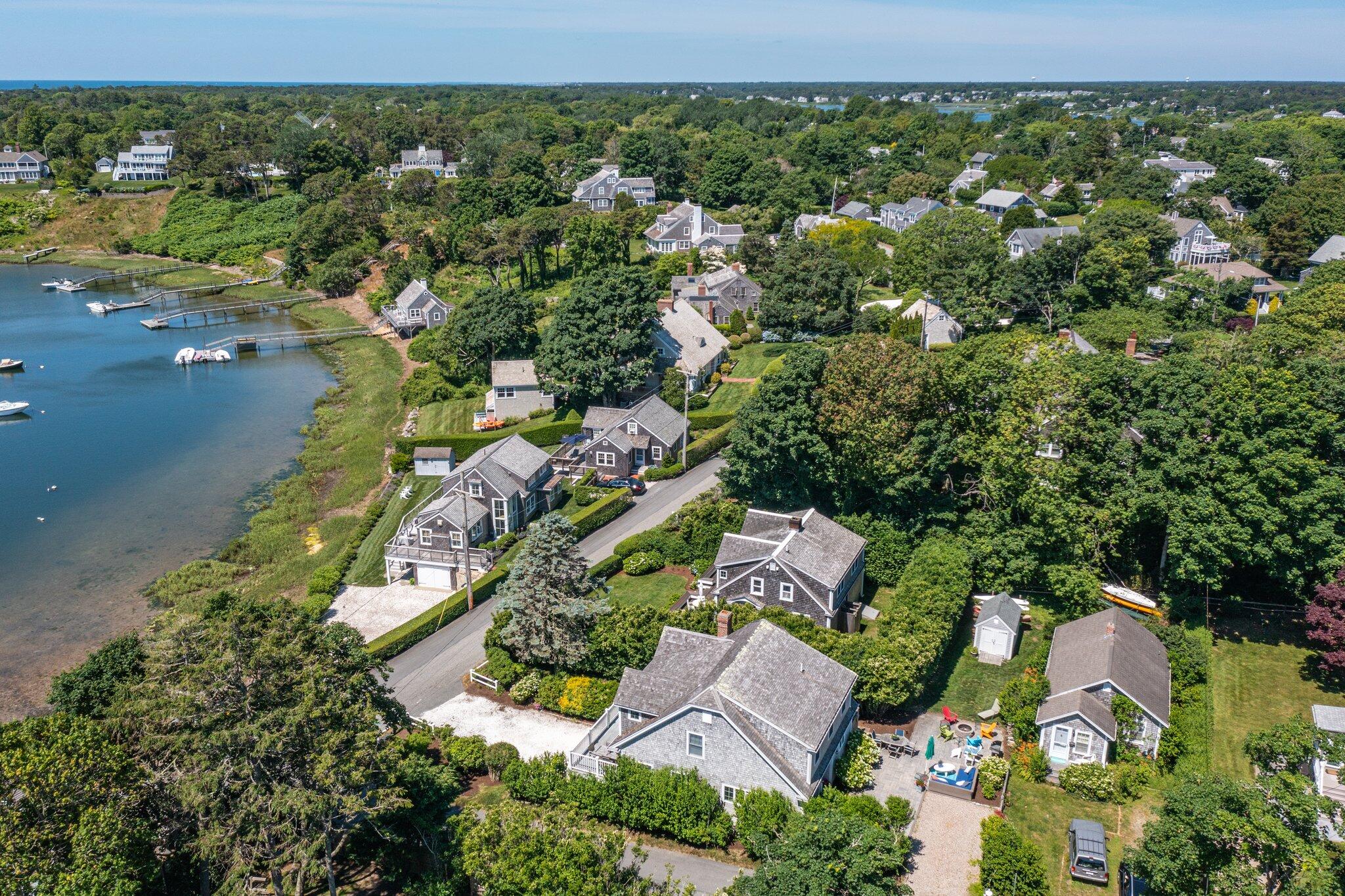 81 Mill Pond Road Chatham, MA 02633 - Photo 45 of 59 an aerial view of residential houses with outdoor space