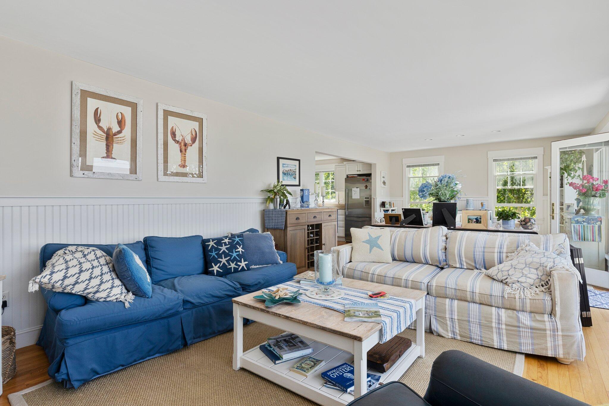 81 Mill Pond Road Chatham, MA 02633 - Photo 8 of 59 a living room with furniture and a couch
