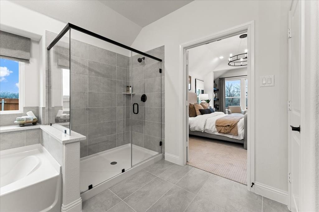 1435 Canadian Lane Van Alstyne, TX 75495 - Photo 9 of 16 a en suite spacious bathroom with a shower tub and view