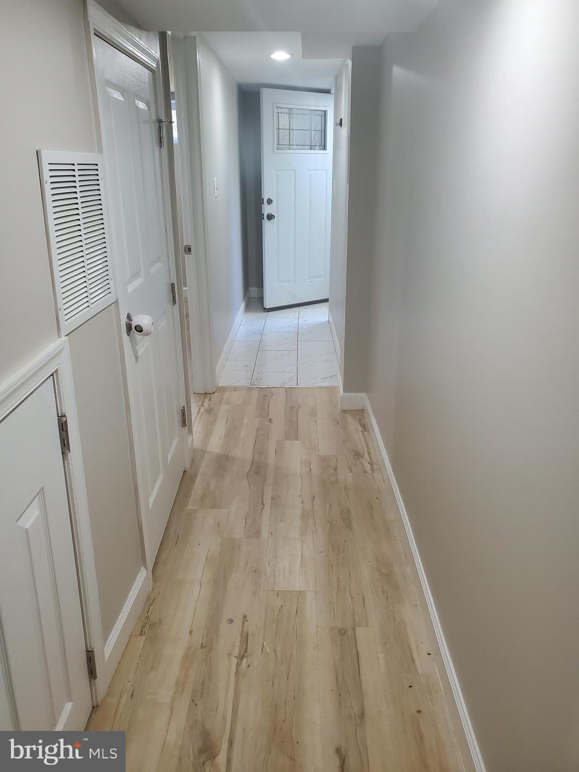 2623 Newton Street Silver Spring, MD 20902 - Photo 18 of 28 Basement hall to rear exit