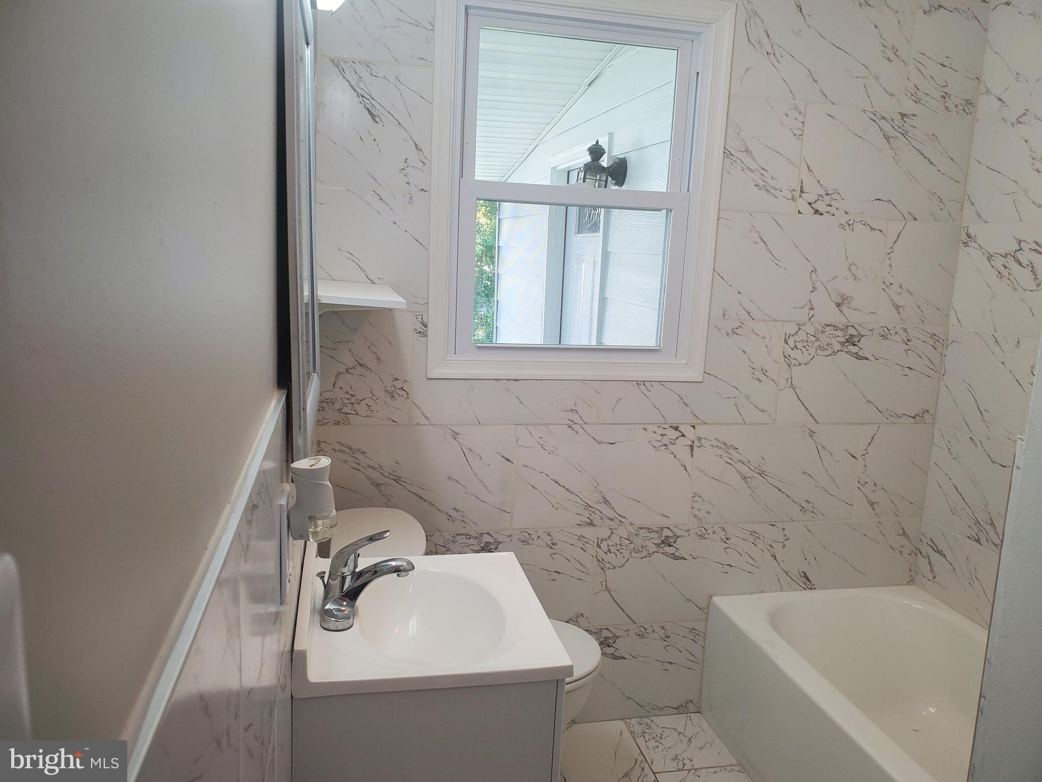 2623 Newton Street Silver Spring, MD 20902 - Photo 9 of 28 1st floor bathroom