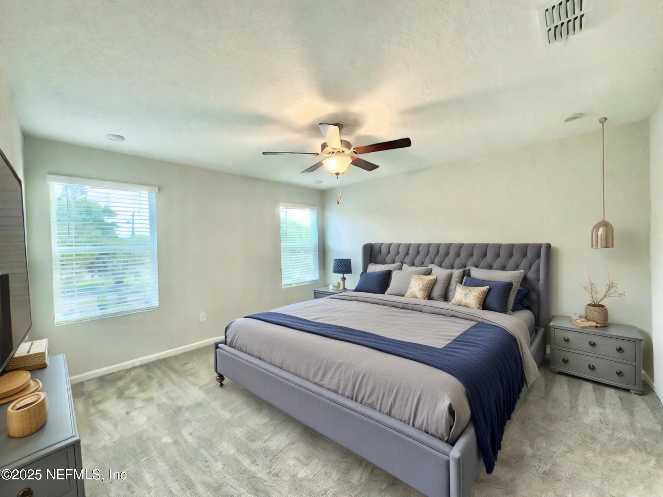 4672 Ribault Park Street Jacksonville, FL 32233 - Photo 11 of 22 a bedroom with a bed and window