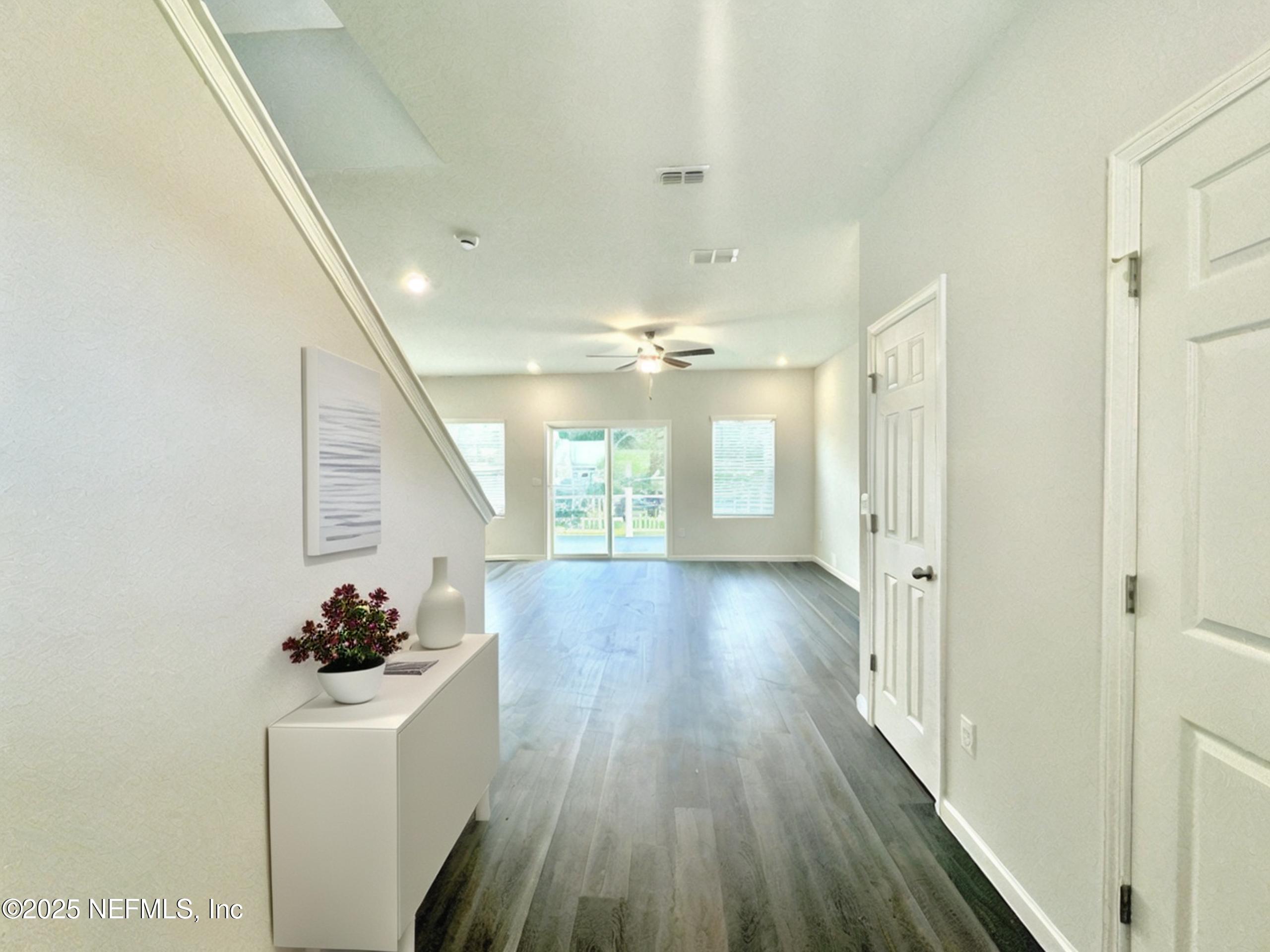 4672 Ribault Park Street Jacksonville, FL 32233 - Photo 3 of 22 a view of entryway with wooden floor