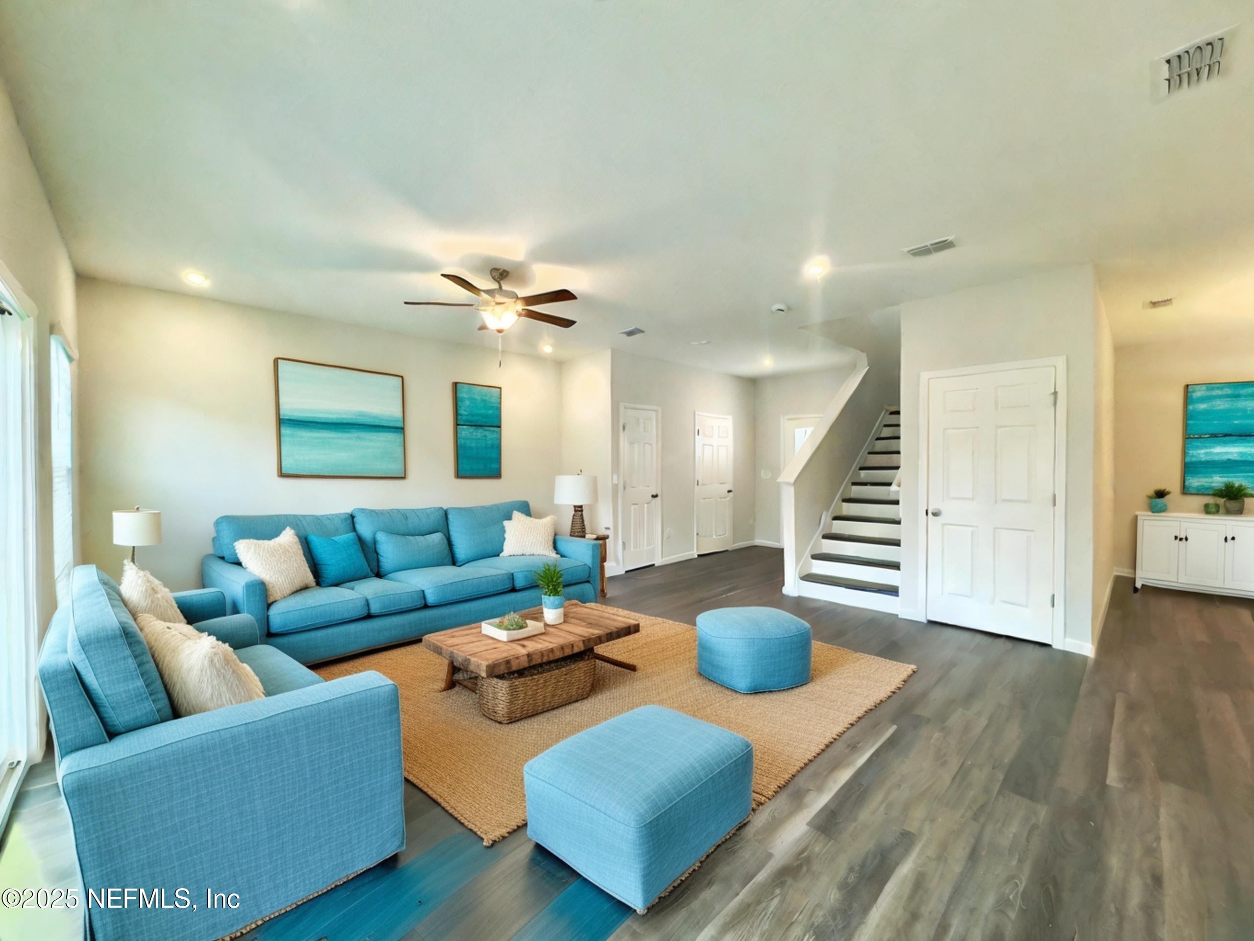 4672 Ribault Park Street Jacksonville, FL 32233 - Photo 4 of 22 a living room with furniture and a wooden floor