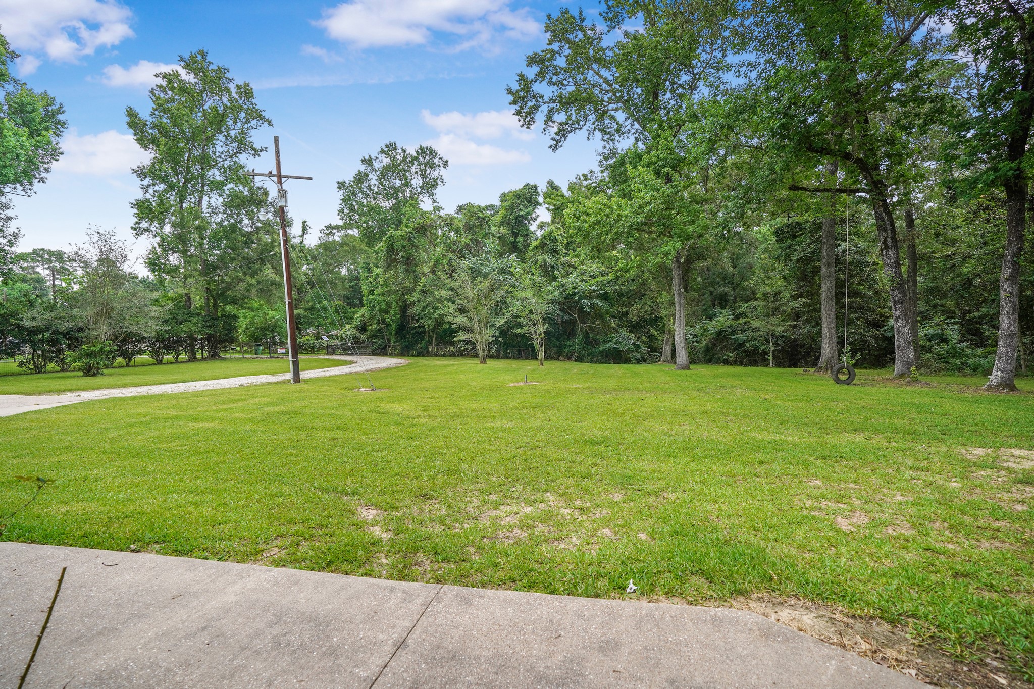1003 Cherry Creek Road Dayton, TX 77535 - Photo 35 of 45 Front yard view. Serene with no close neighbors.