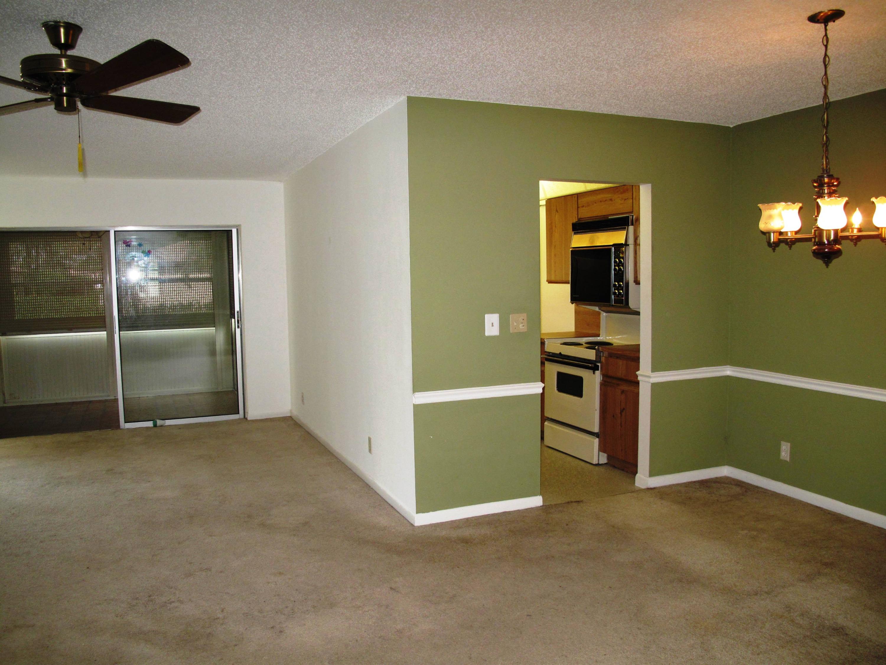 5220 Nesting Way, Unit C Delray Beach, FL 33484 - Photo 13 of 32 Living dining and Florida room view
