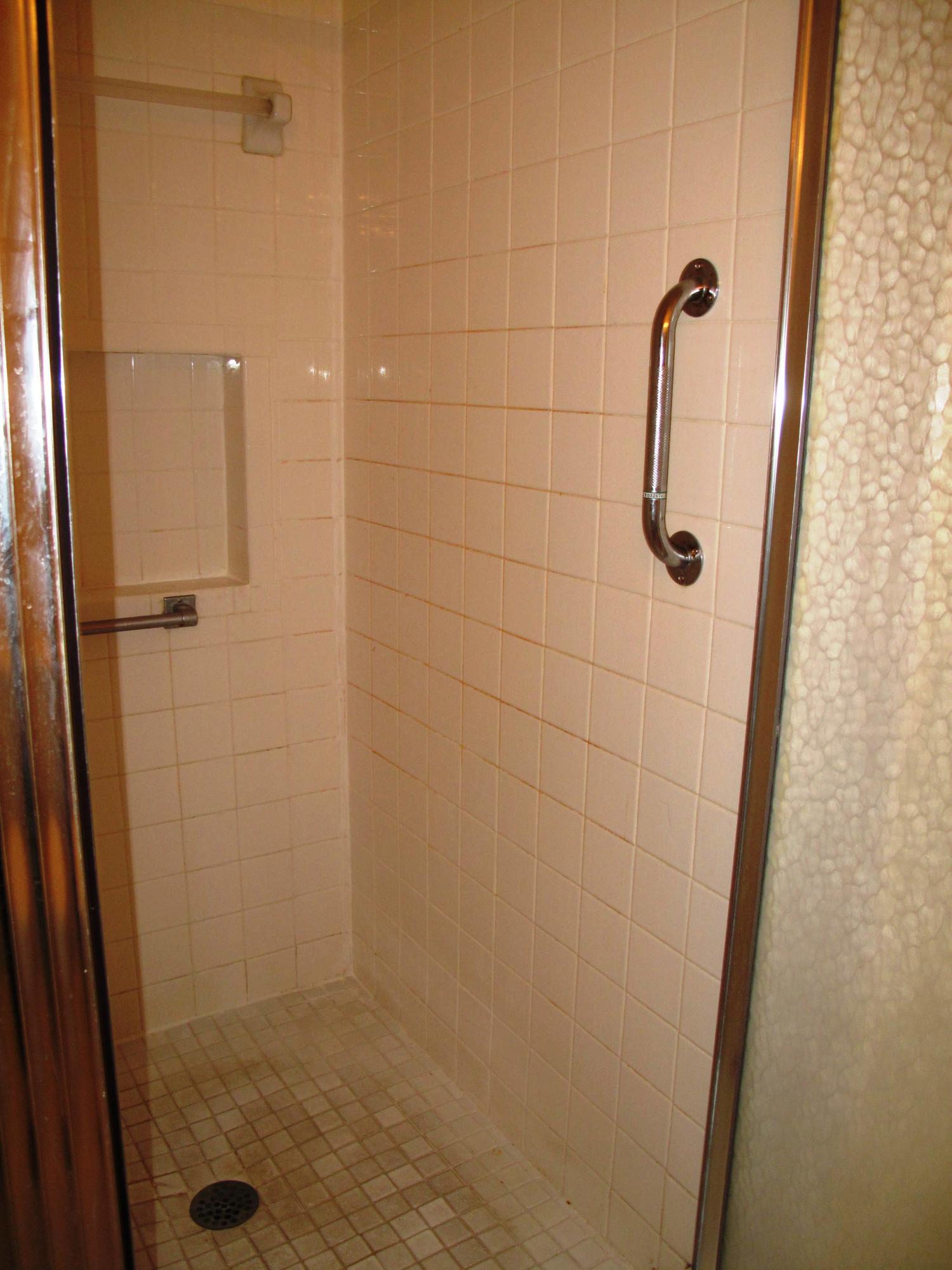 5220 Nesting Way, Unit C Delray Beach, FL 33484 - Photo 15 of 32 Guest bathroom with full shower stall (1