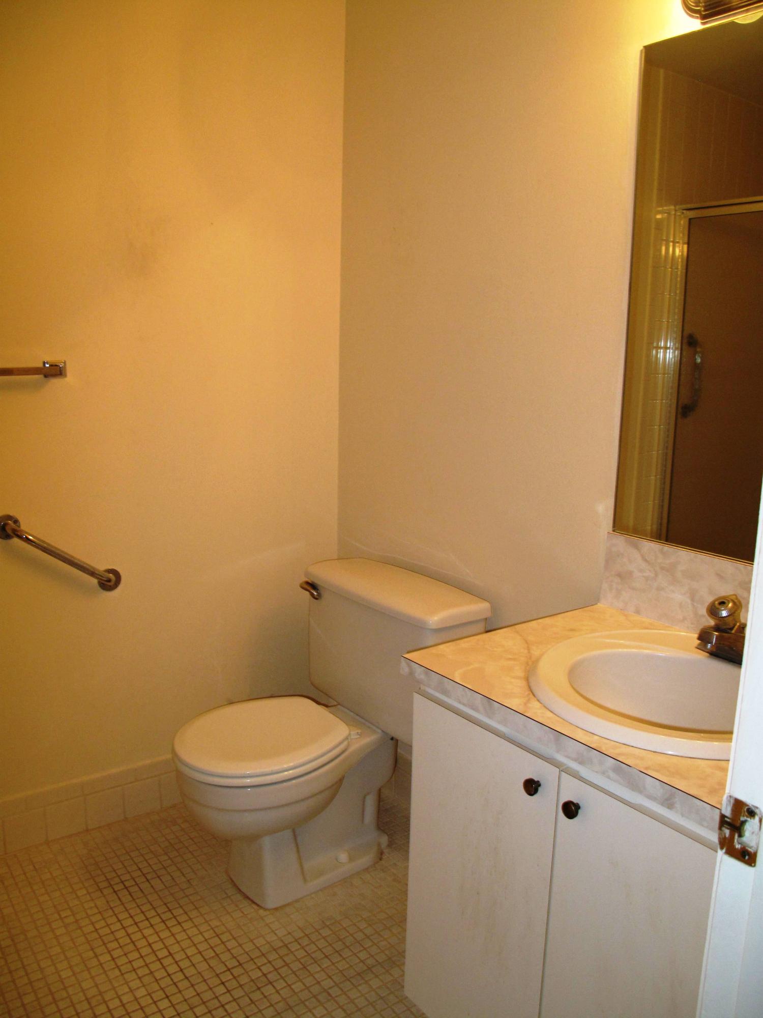 5220 Nesting Way, Unit C Delray Beach, FL 33484 - Photo 16 of 32 Guest bathroom with full shower stall (2