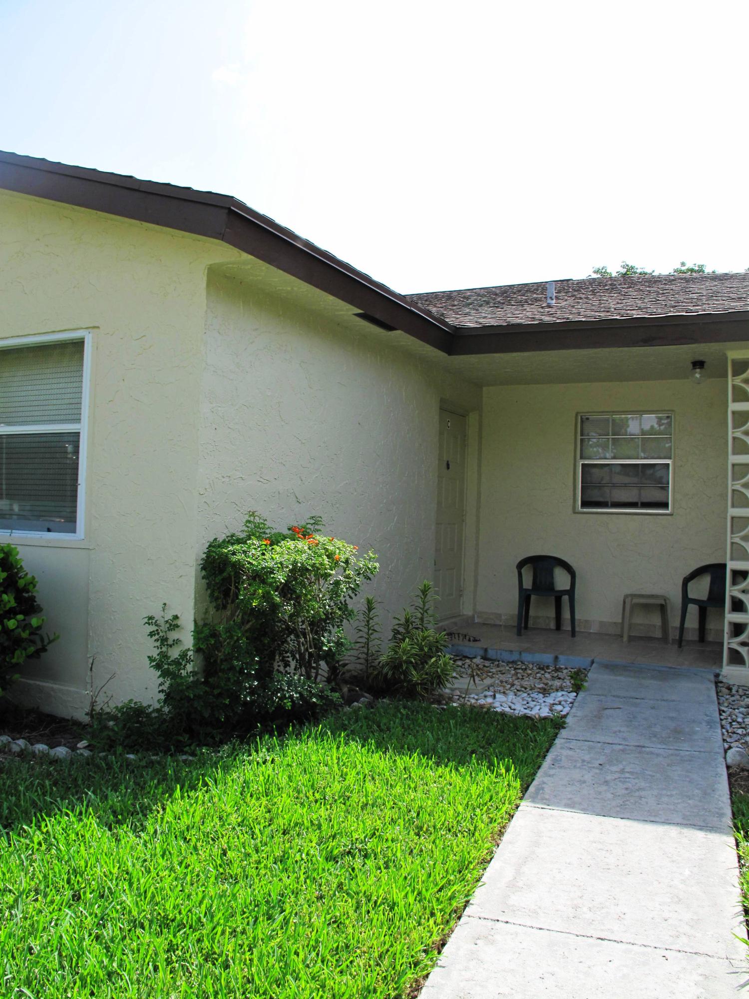 5220 Nesting Way, Unit C Delray Beach, FL 33484 - Photo 2 of 32 Entrance to villa