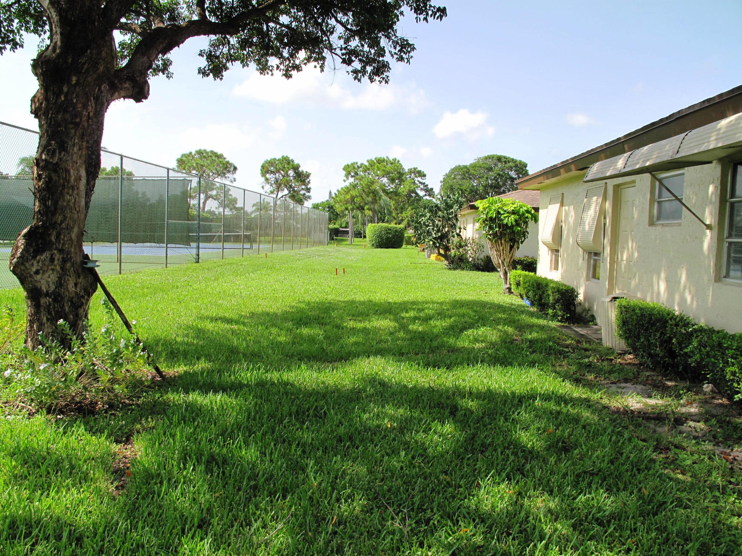 5220 Nesting Way, Unit C Delray Beach, FL 33484 - Photo 25 of 32 Back yard view