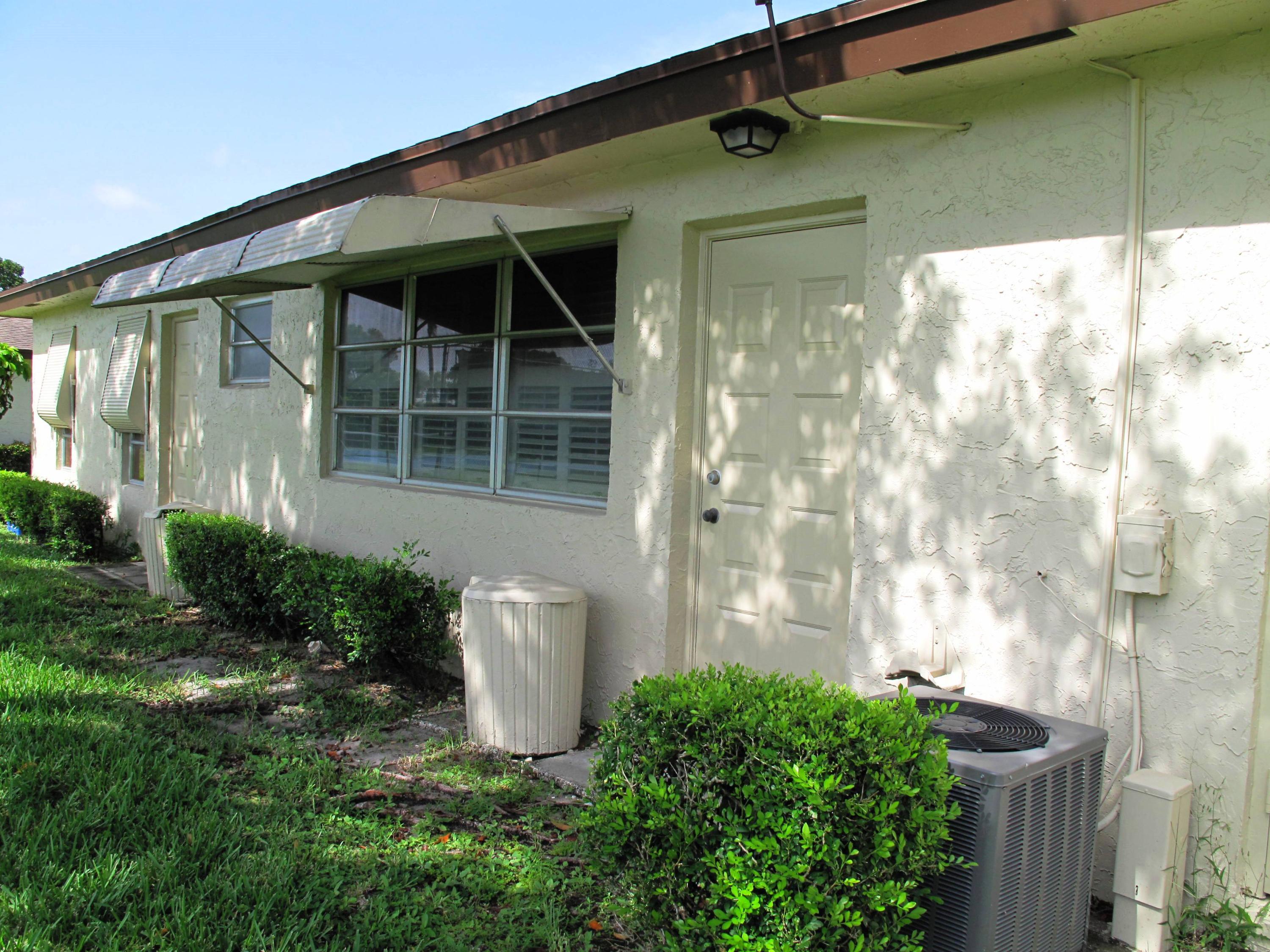 5220 Nesting Way, Unit C Delray Beach, FL 33484 - Photo 26 of 32 Exterior view of villa
