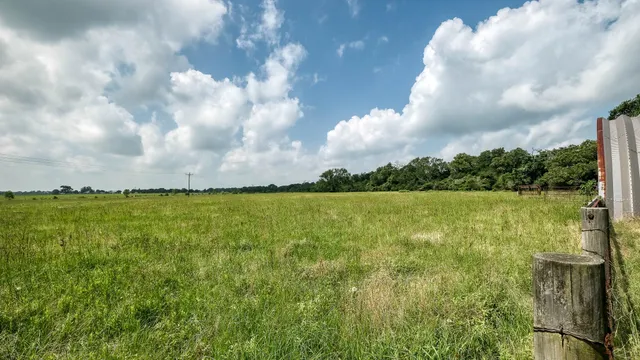 a view of lake with green space