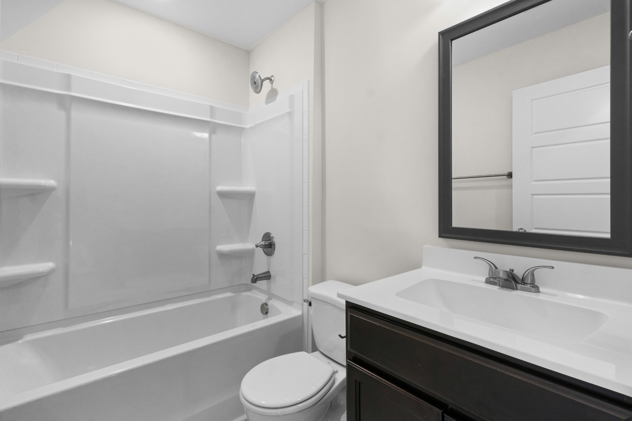2138 Ireland Way Clarksville, TN 37042 - Photo 28 of 37 a bathroom with a granite countertop sink toilet and shower