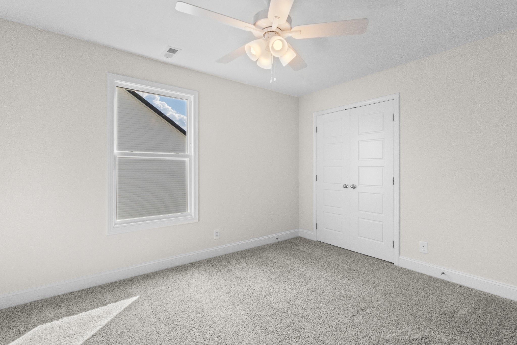 2138 Ireland Way Clarksville, TN 37042 - Photo 29 of 37 an empty room with a window and ceiling fan