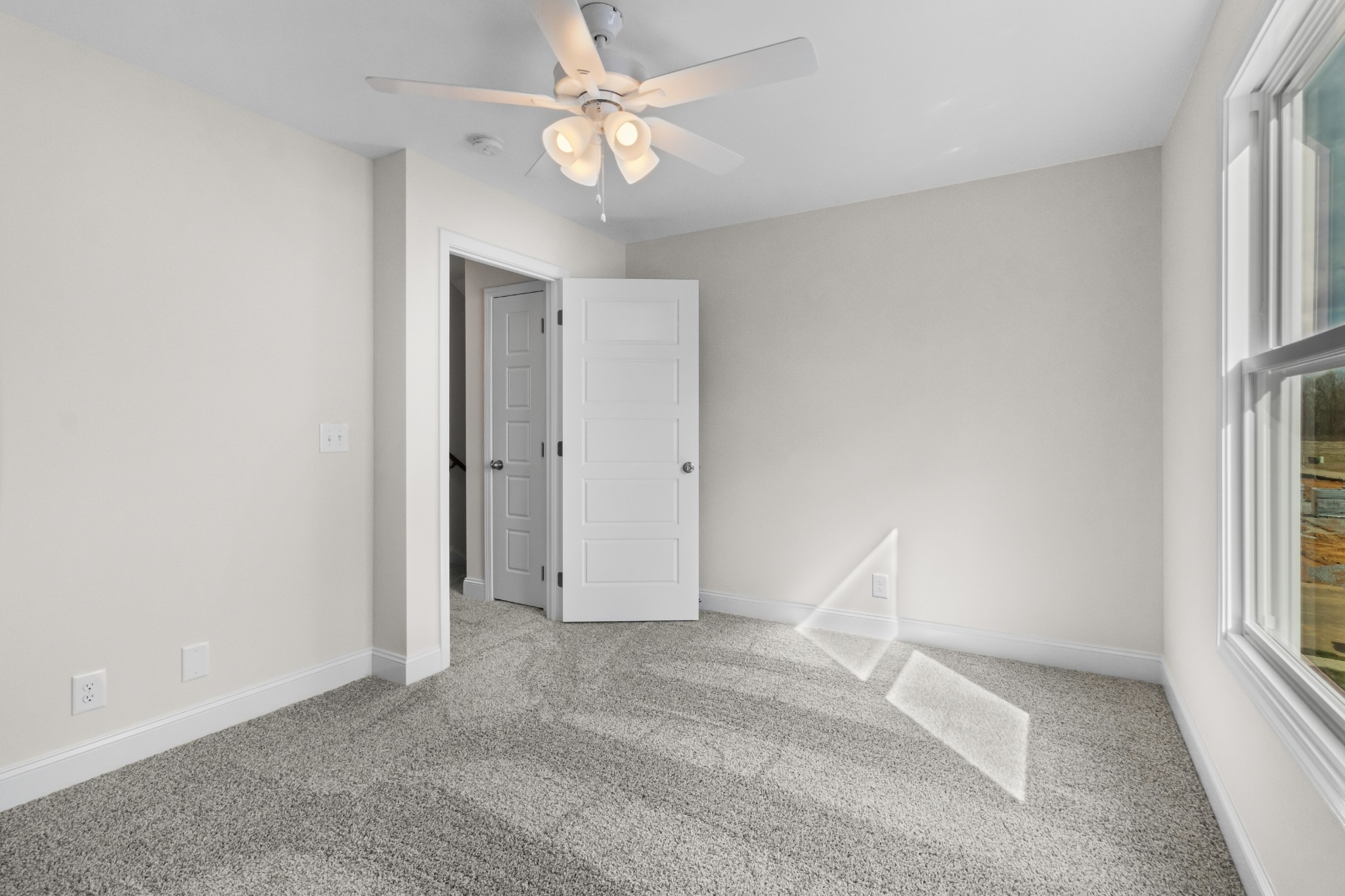 2138 Ireland Way Clarksville, TN 37042 - Photo 30 of 37 an empty room with windows and fan