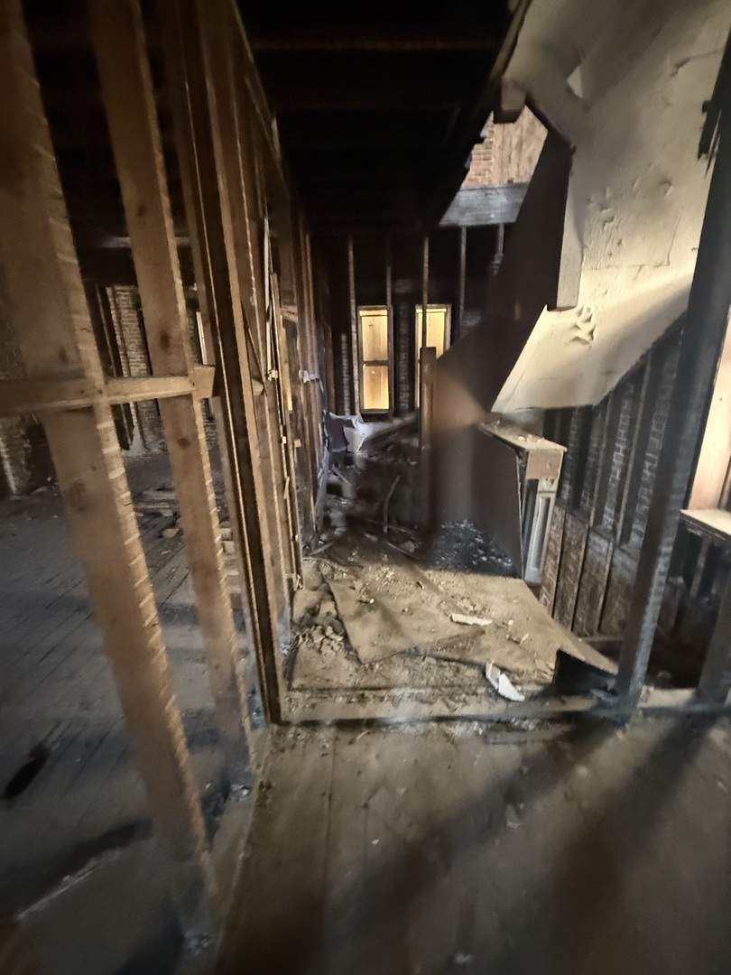 3600 West 16th Street Chicago, IL 60623 - Photo 19 of 21 a view of an empty room with stairs