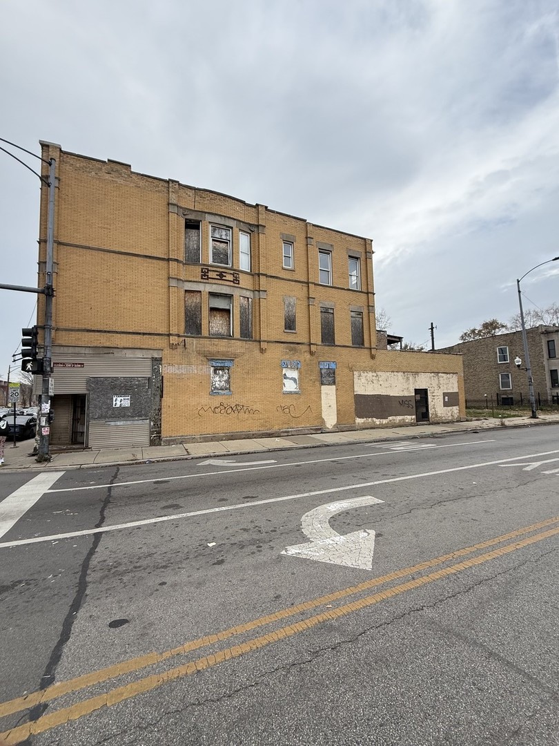 3600 West 16th Street Chicago, IL 60623 - Photo 7 of 21 a view of building with car parked on the road