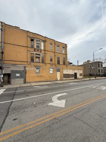 a view of building with city street