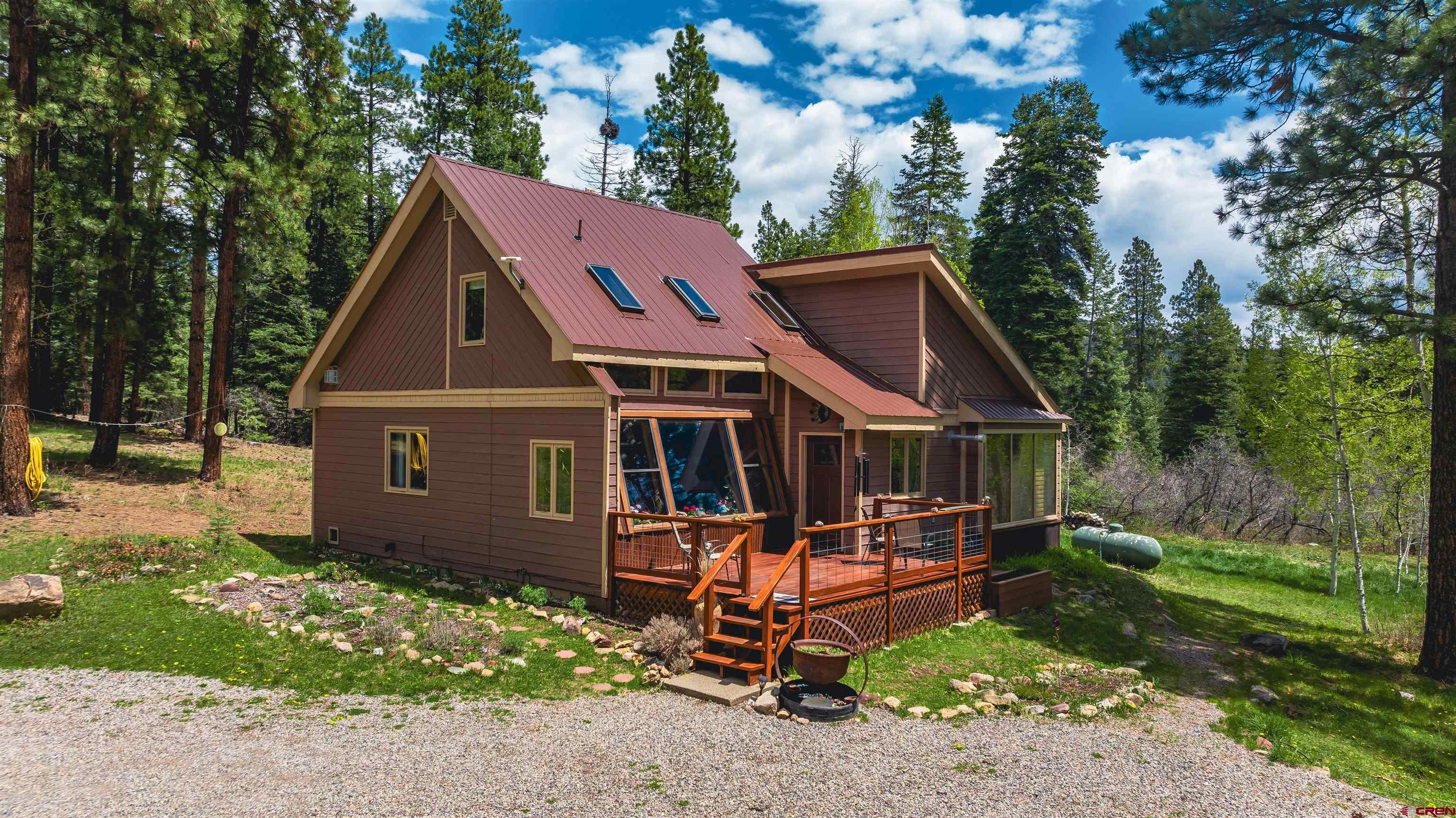 520 Los Ranchitos Drive Durango, CO 81301 - Photo 1 of 36 a front view of a house with a yard