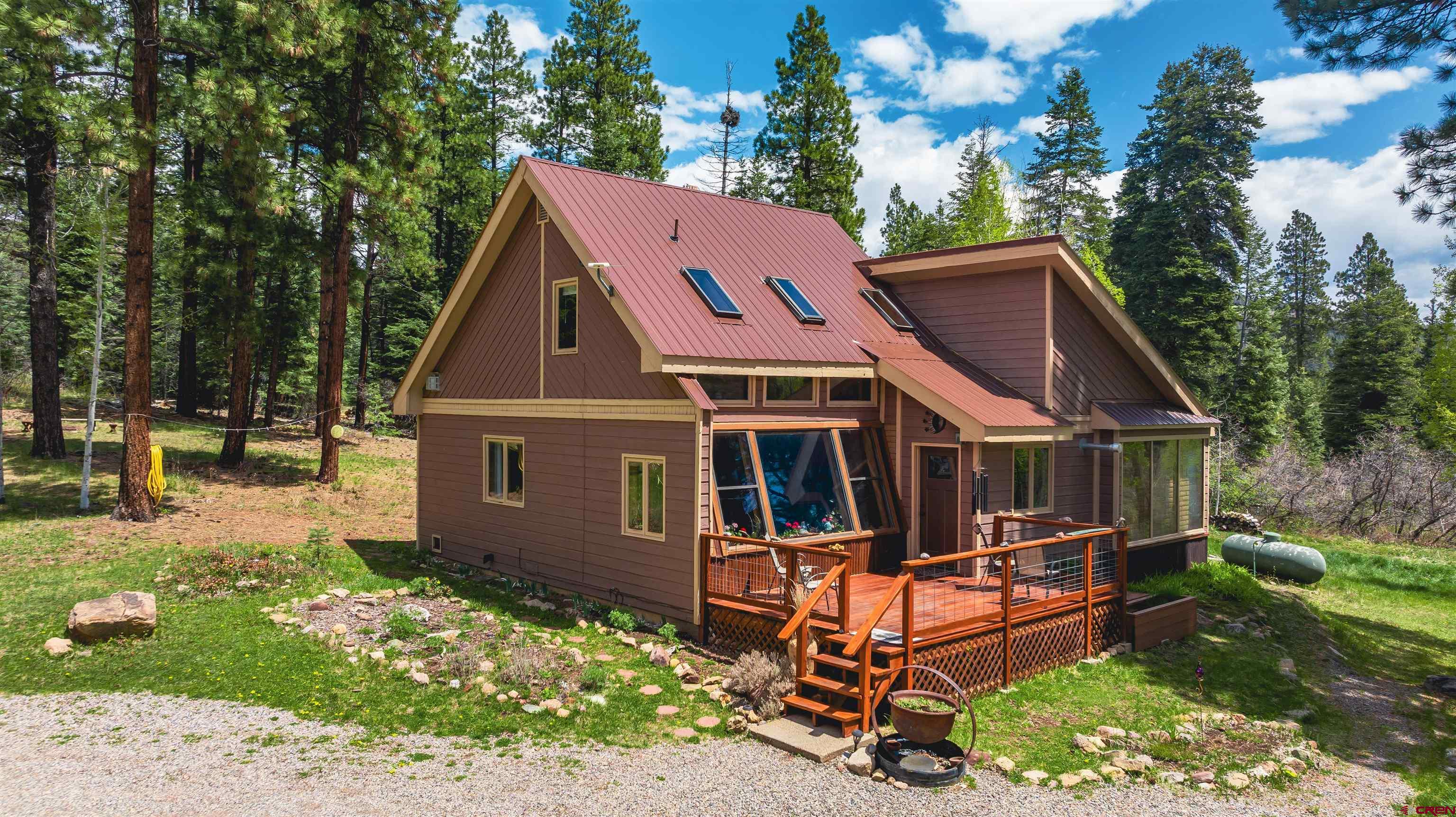 520 Los Ranchitos Drive Durango, CO 81301 - Photo 2 of 36 front view of house with a yard