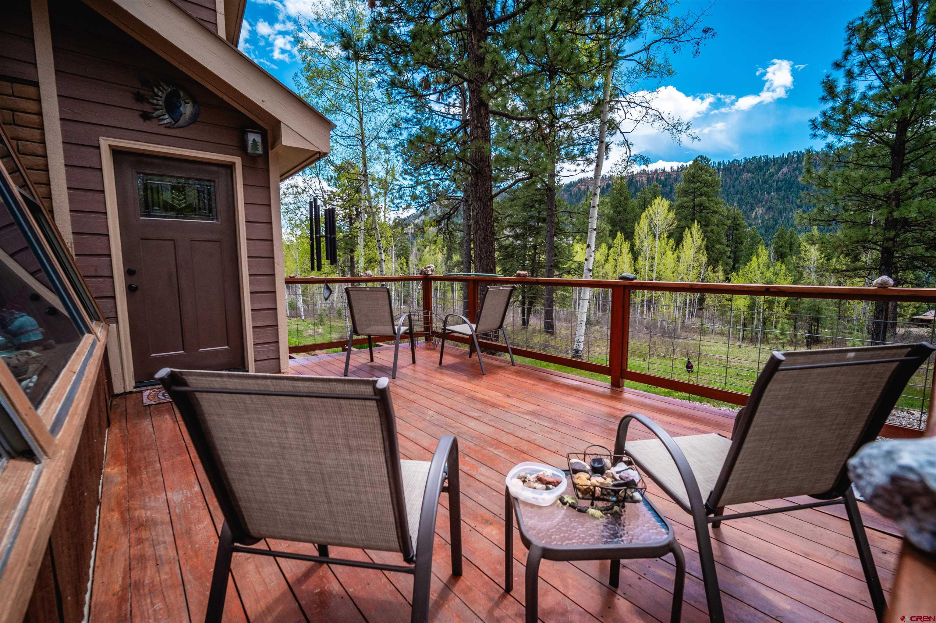 520 Los Ranchitos Drive Durango, CO 81301 - Photo 25 of 36 a view of a chairs and table in the balcony