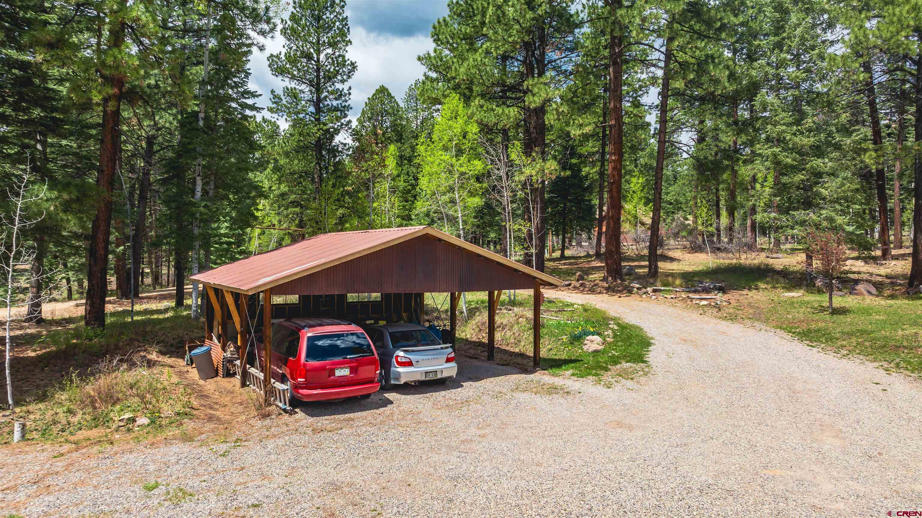 520 Los Ranchitos Drive Durango, CO 81301 - Photo 3 of 36 a view of a car parked in front of a house