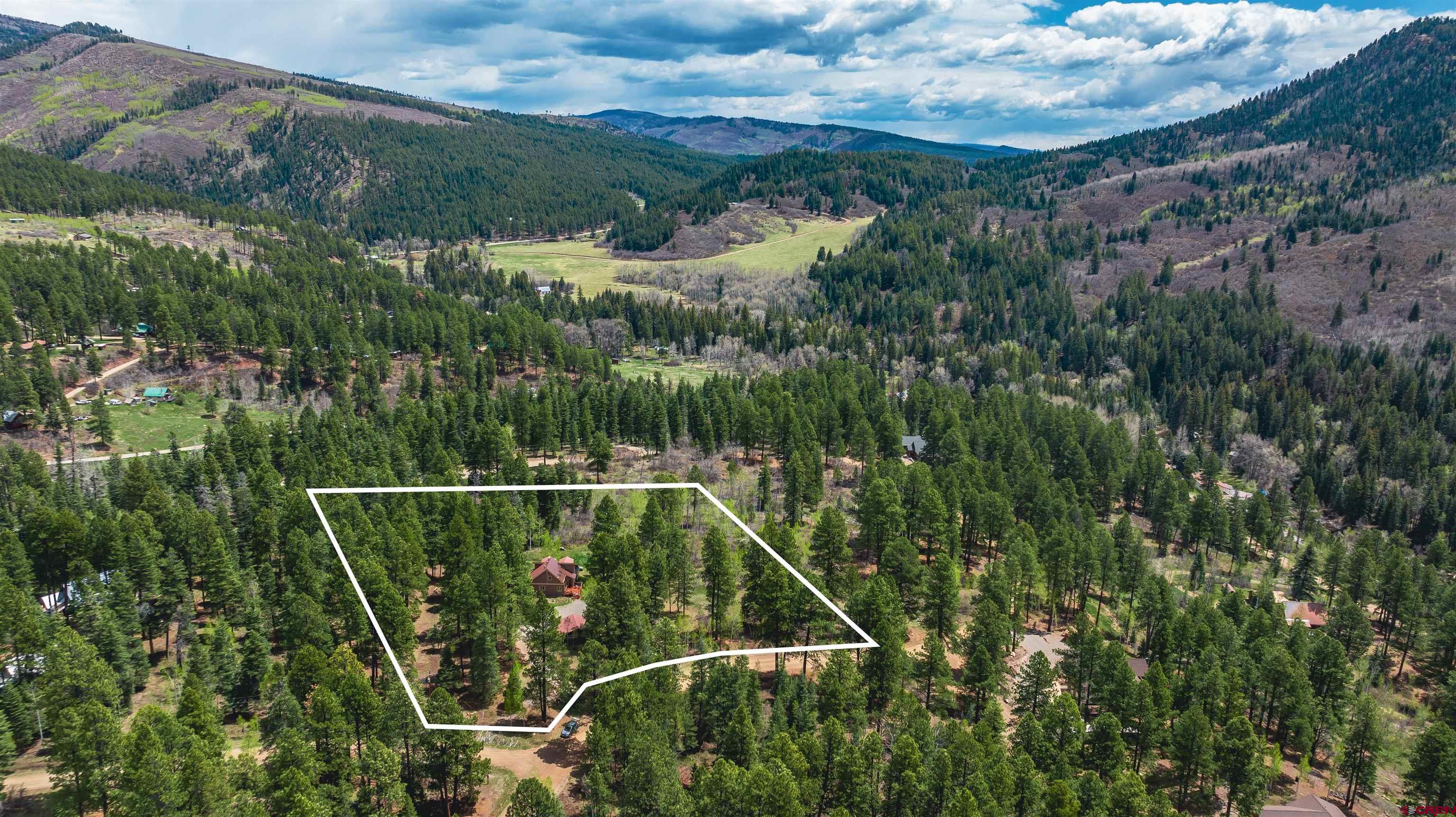520 Los Ranchitos Drive Durango, CO 81301 - Photo 6 of 36 an aerial view of a house with a yard