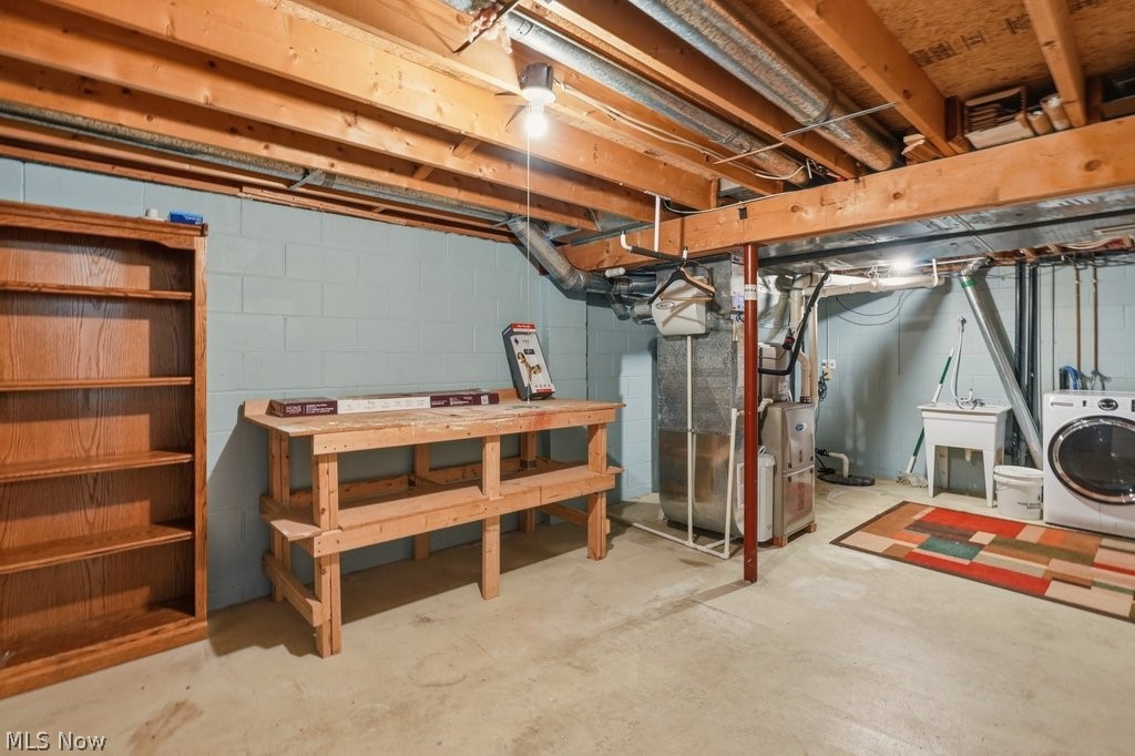 5321 Young Road Stow, OH 44224 - Photo 37 of 37 Unfinished basement offering exposed wood joists and concrete block walls