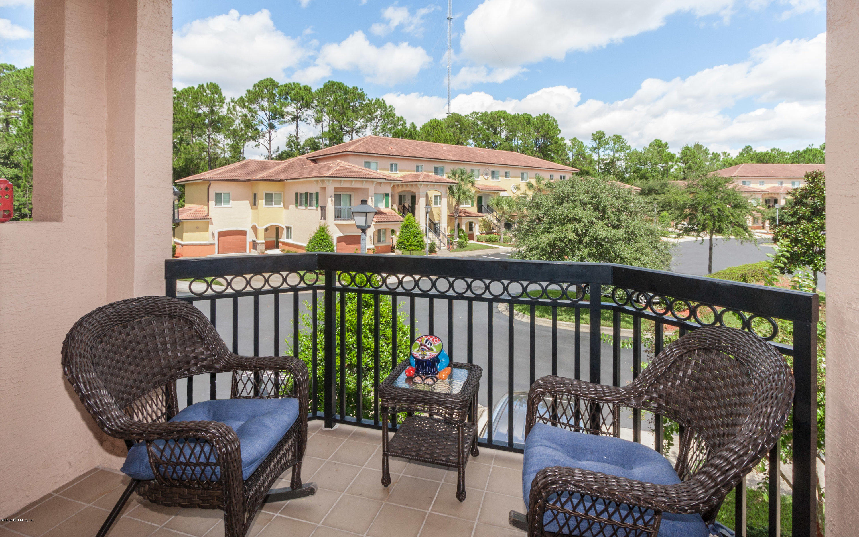 9745 Touchton Road, Unit 2521 Jacksonville, FL 32246 - Photo 2 of 31 a view of a two chairs and table in the balcony