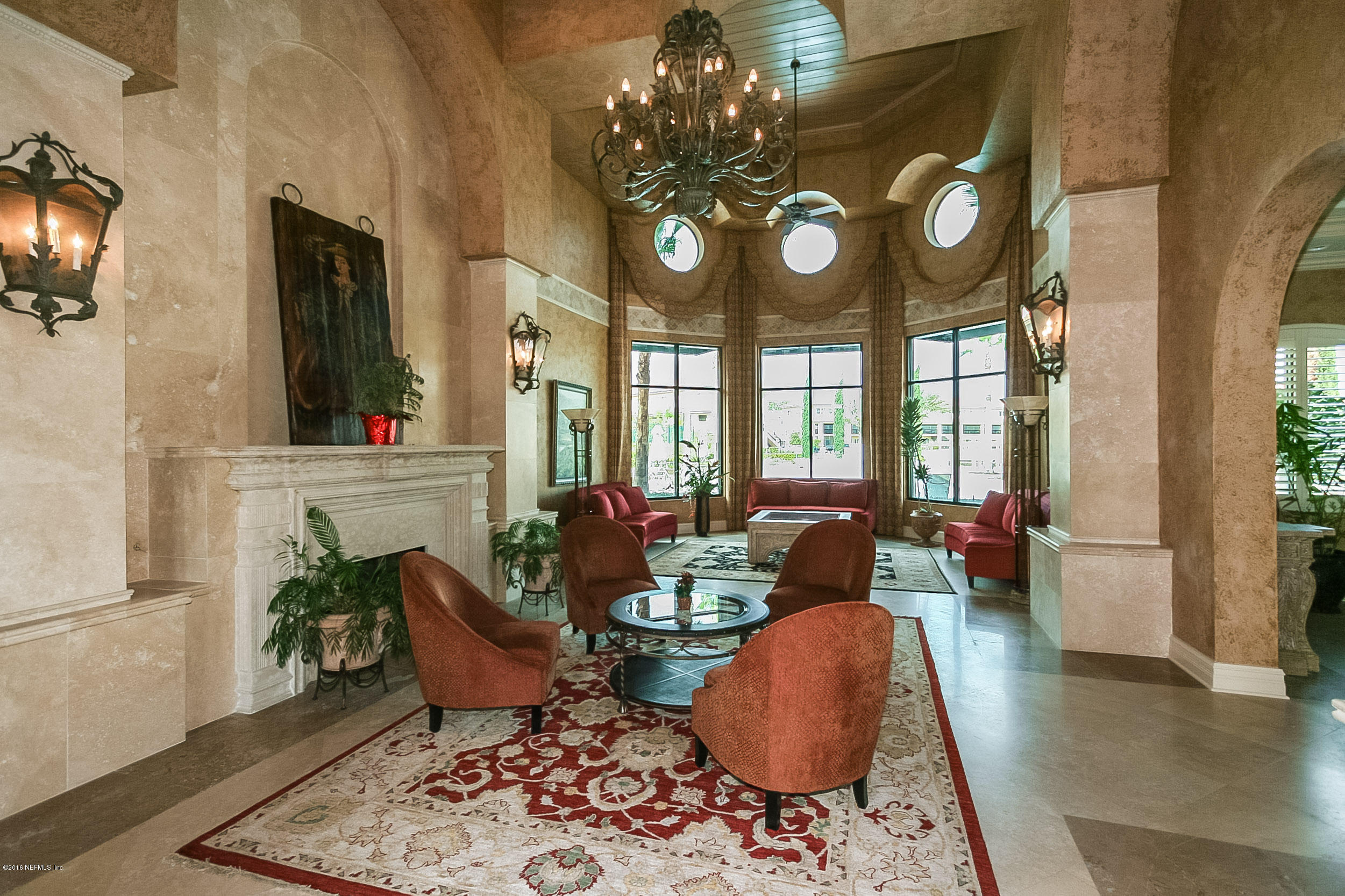 9745 Touchton Road, Unit 2521 Jacksonville, FL 32246 - Photo 22 of 31 a living room with furniture and a large window