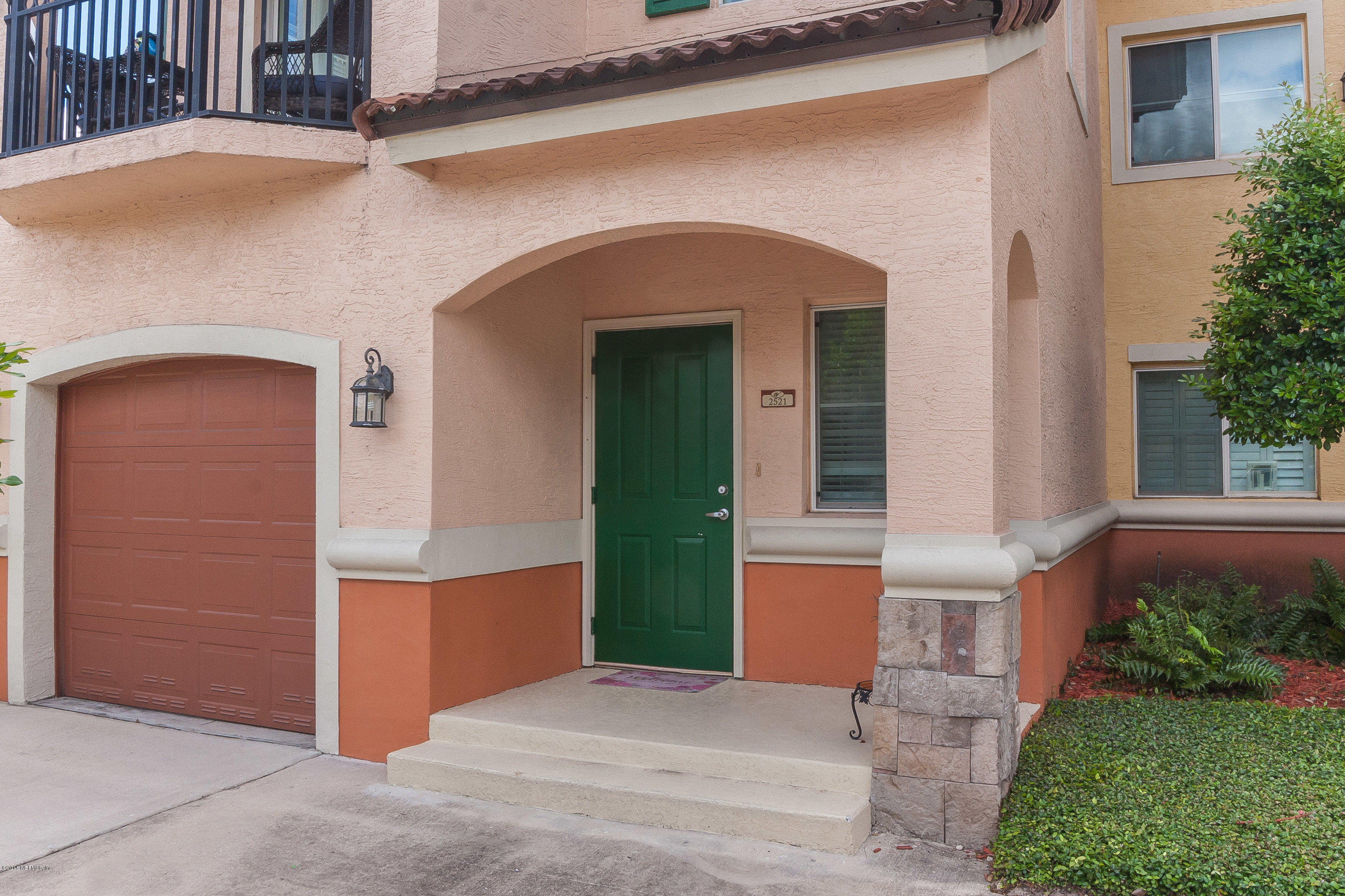 9745 Touchton Road, Unit 2521 Jacksonville, FL 32246 - Photo 31 of 31 a front view of a house with a yard