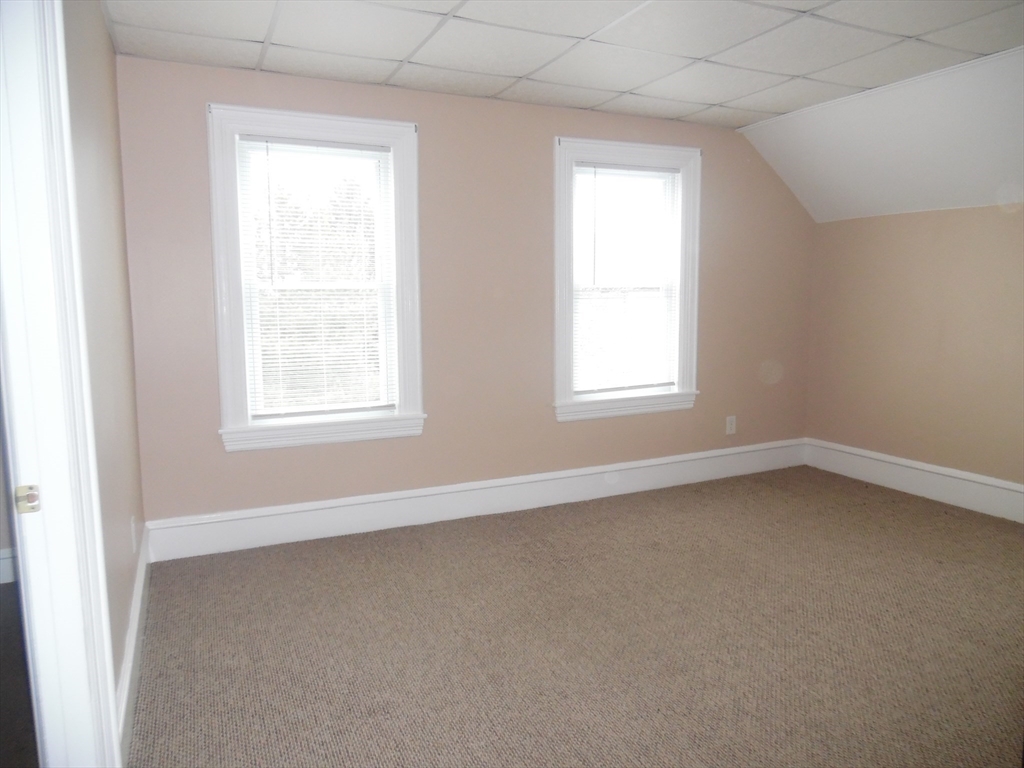 1199 Rodman Street, Unit 3 Fall River, MA 02721 - Photo 3 of 8 an empty room with a window