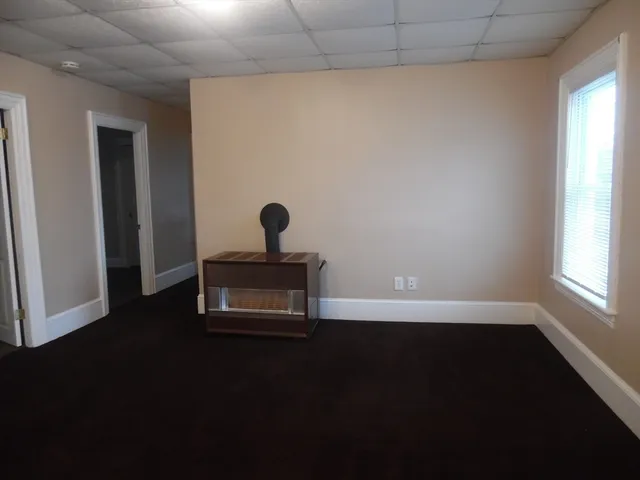 a empty room with a window