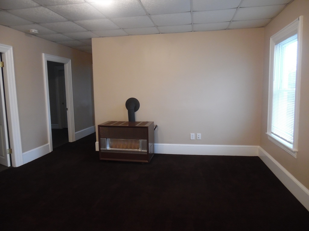 1199 Rodman Street, Unit 3 Fall River, MA 02721 - Photo 7 of 8 a empty room with a window