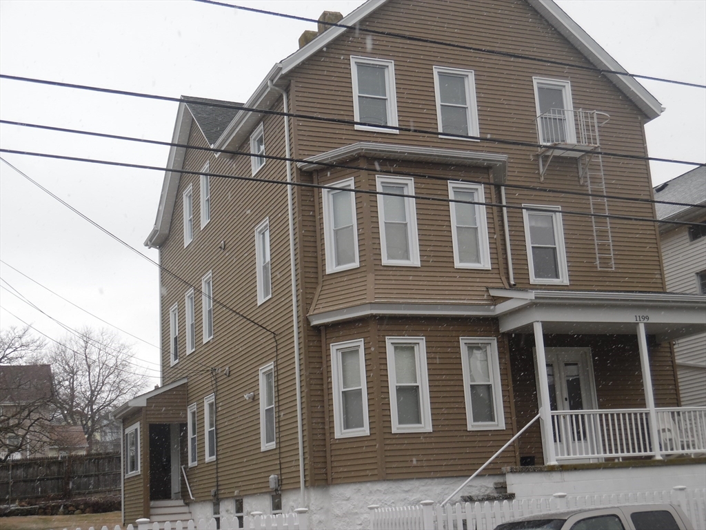 1199 Rodman Street, Unit 3 Fall River, MA 02721 - Photo 8 of 8 a front view of a house