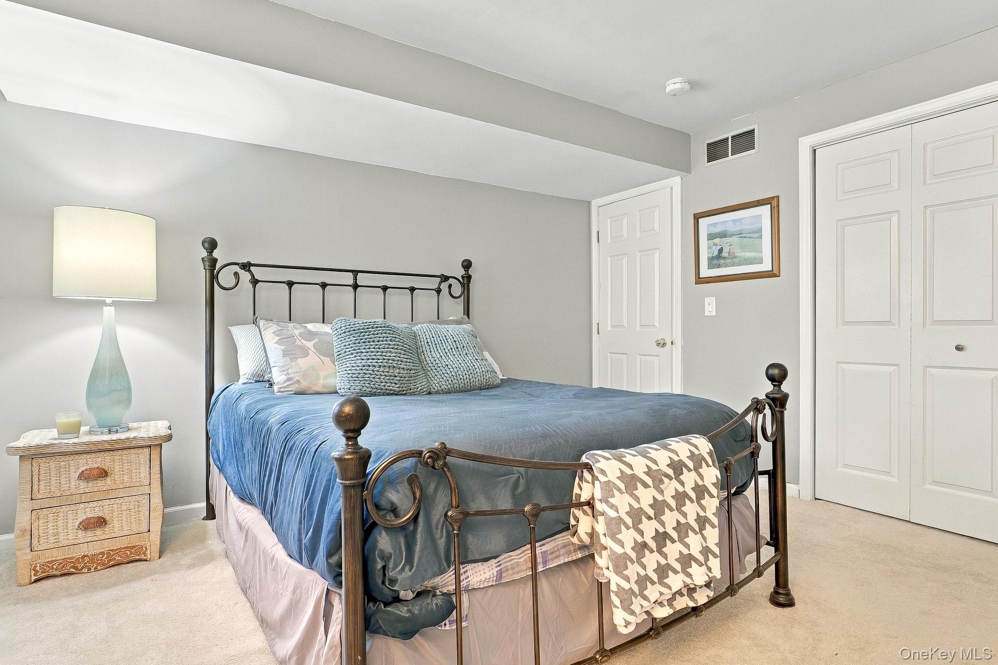 48 Mac Farlane Road Wappingers Falls, NY 12590 - Photo 26 of 47 Plush carpeting, neutral wall color, and a white six-panel door